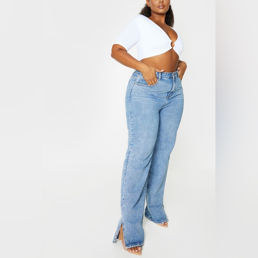 PrettyLittleThing Plus Size 16.  Light Wash Split Hem Jeans